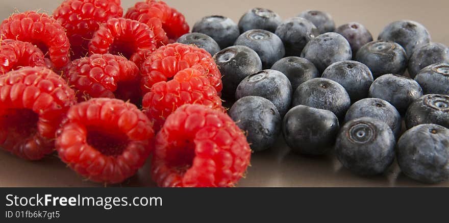 Blueberries and raspberries.