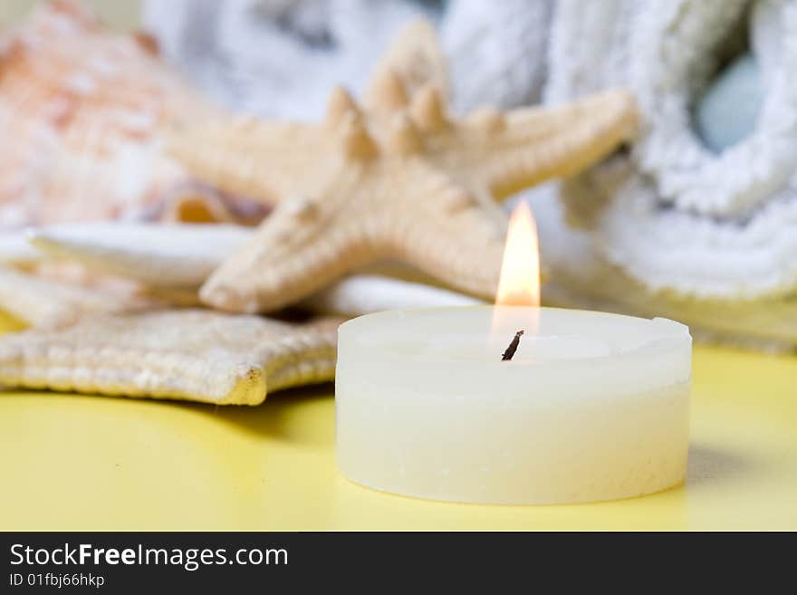 Candle  on a yelow background