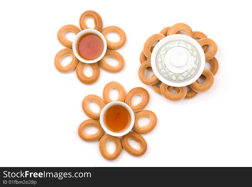 Abstract flowers made of bread-rings and chinese service. Abstract flowers made of bread-rings and chinese service