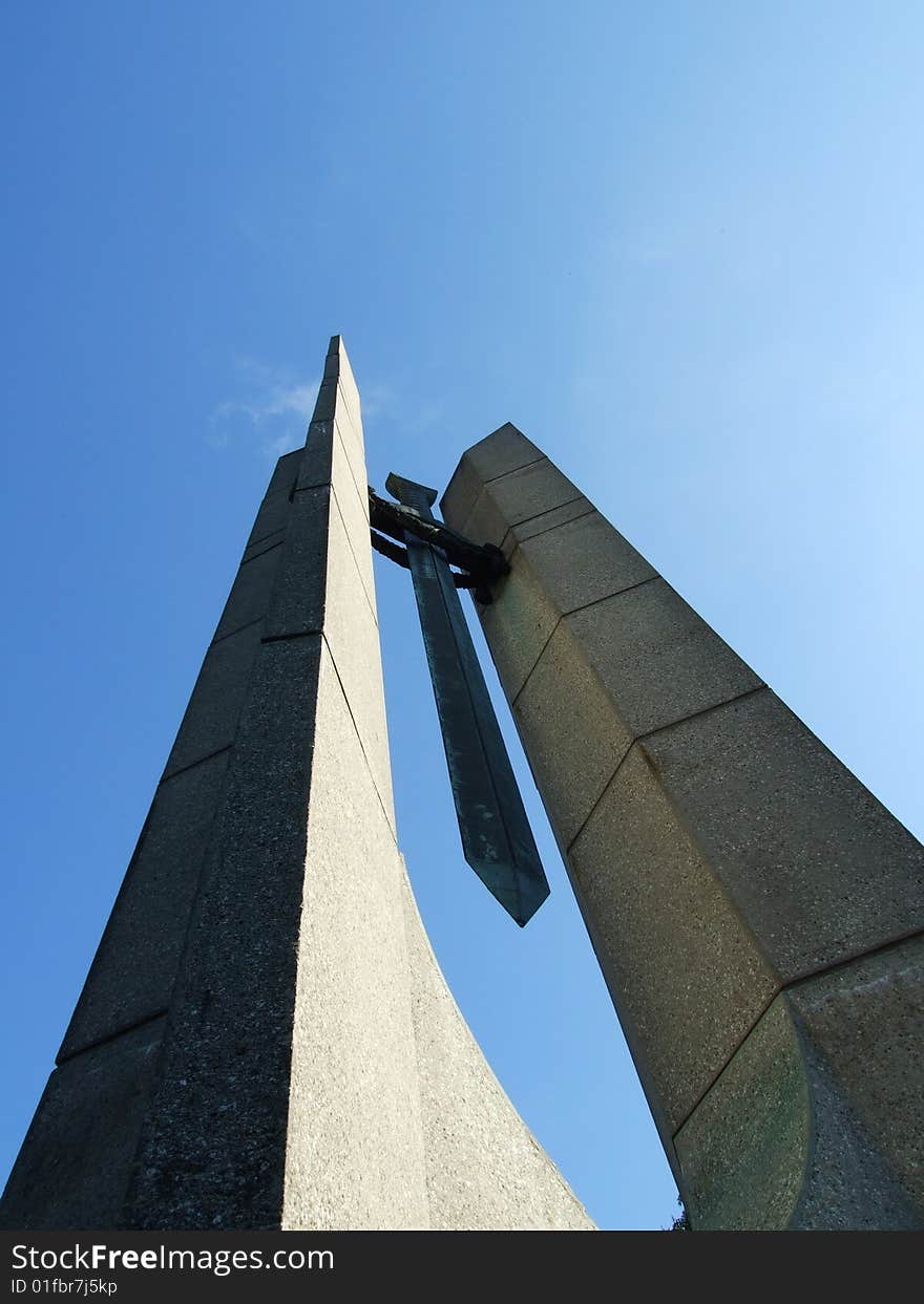 Big sword statue. Blue sky