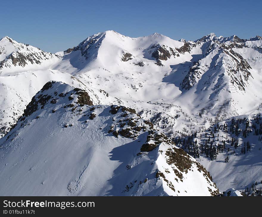 White mountains with blue sky