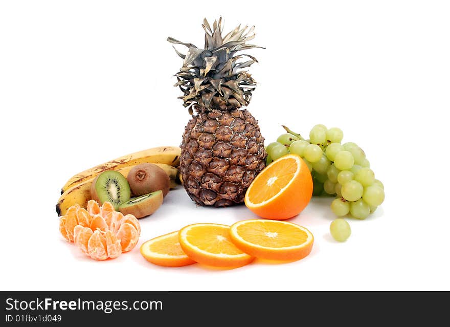 Assorted fruits: kiwi, grapes, pineapple...