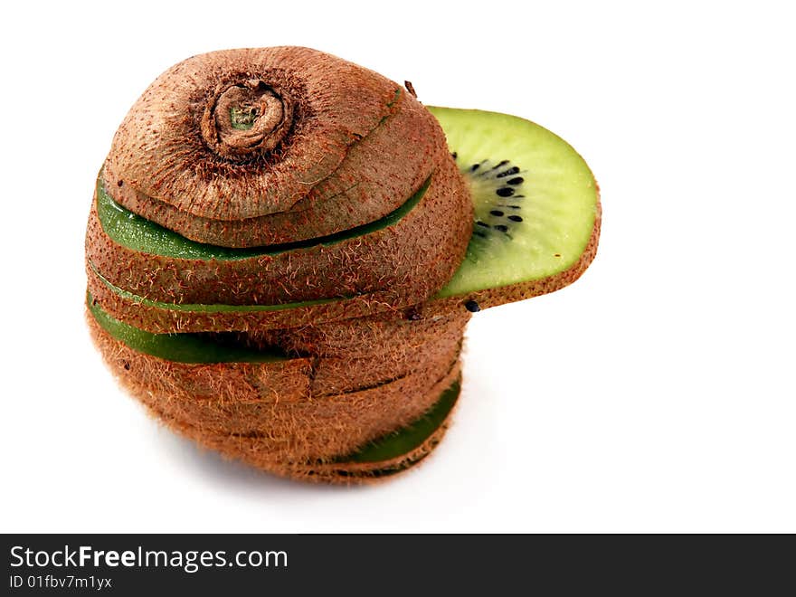 Beautiful green texture consisting of slices of kiwifruit on a white background