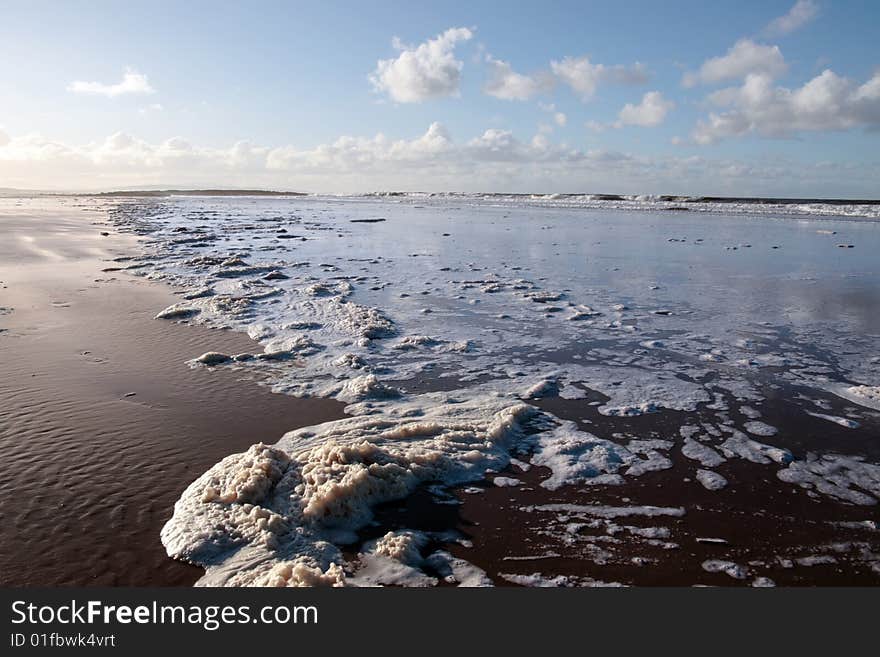 The waves crashing in on ballybunion beach ireland. The waves crashing in on ballybunion beach ireland