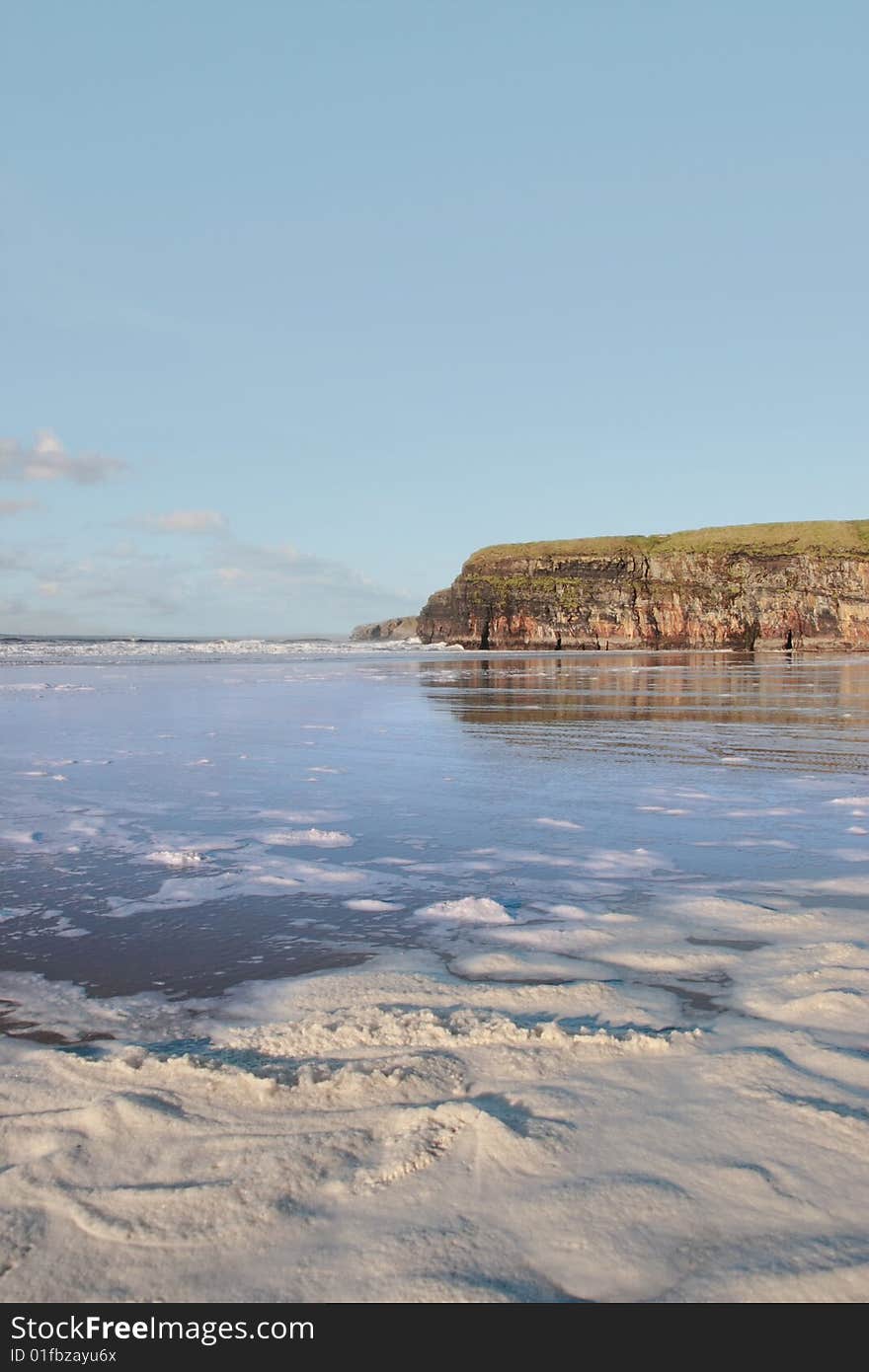 The storm waves crashing in on ballybunion beach ireland