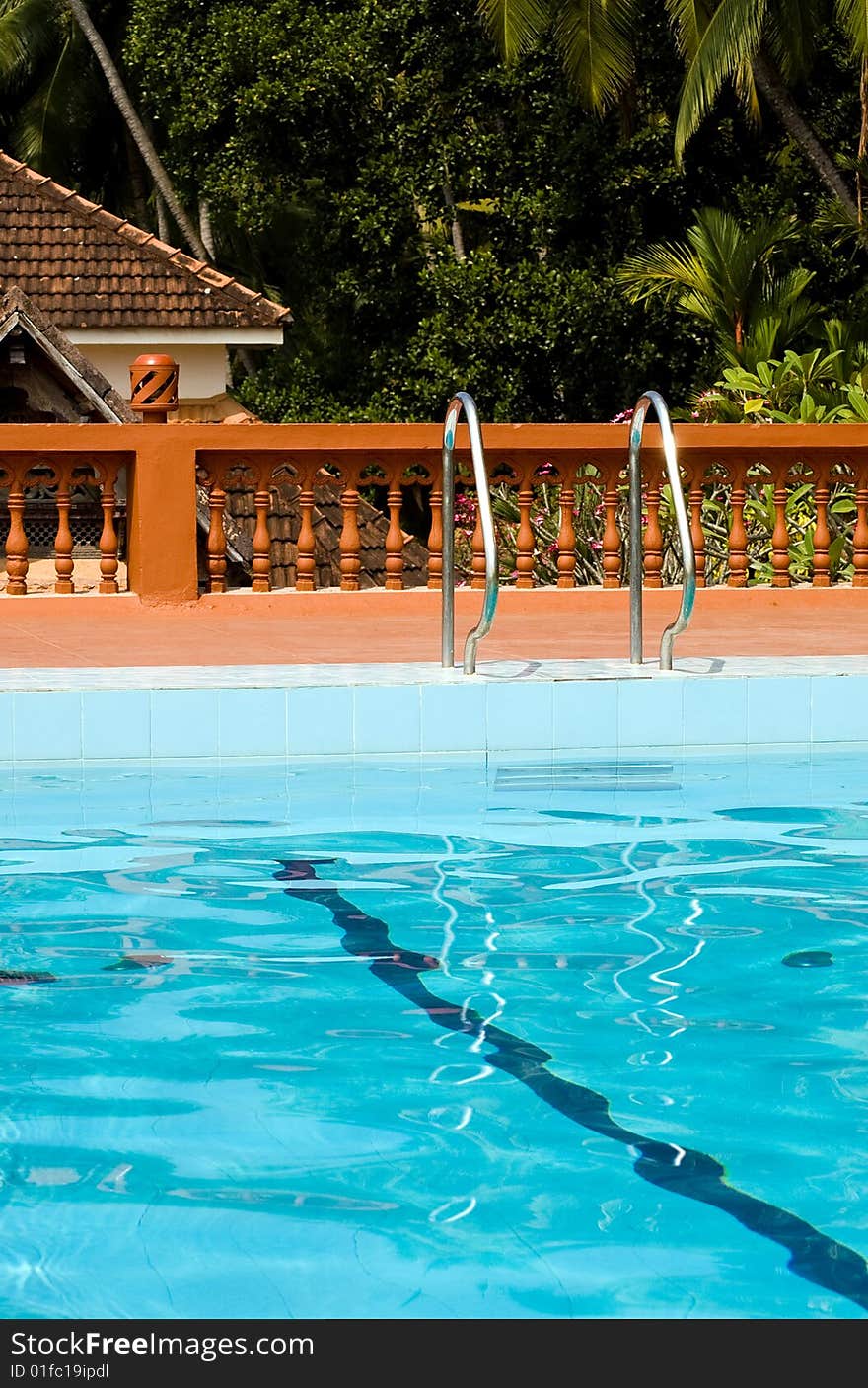 Recreation area with swimming pool in indian holiday resort, Kerala