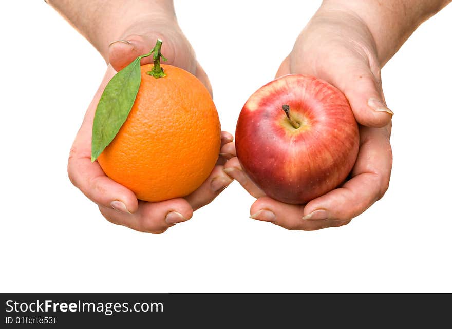 Apple and orange in hands