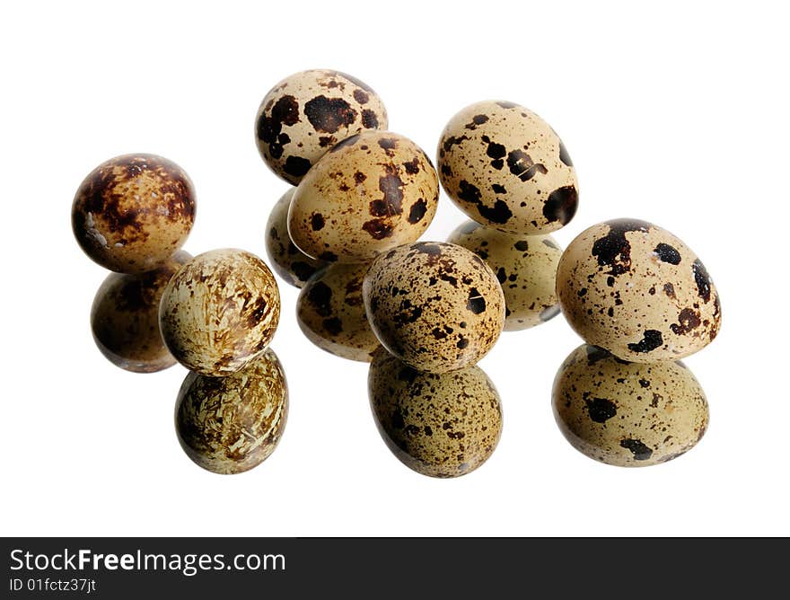 Quail eggs isolated on white