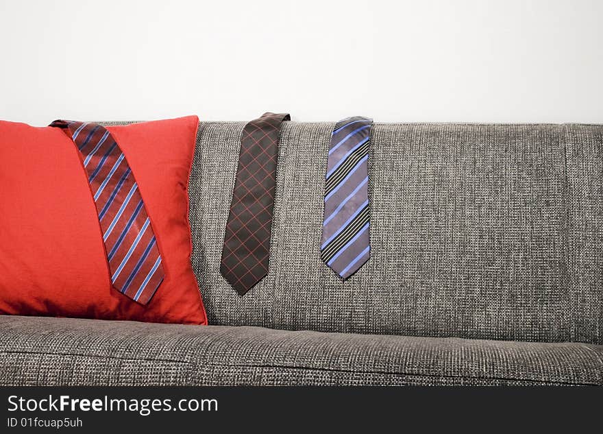 Ties hanging on a sofa. Ties hanging on a sofa