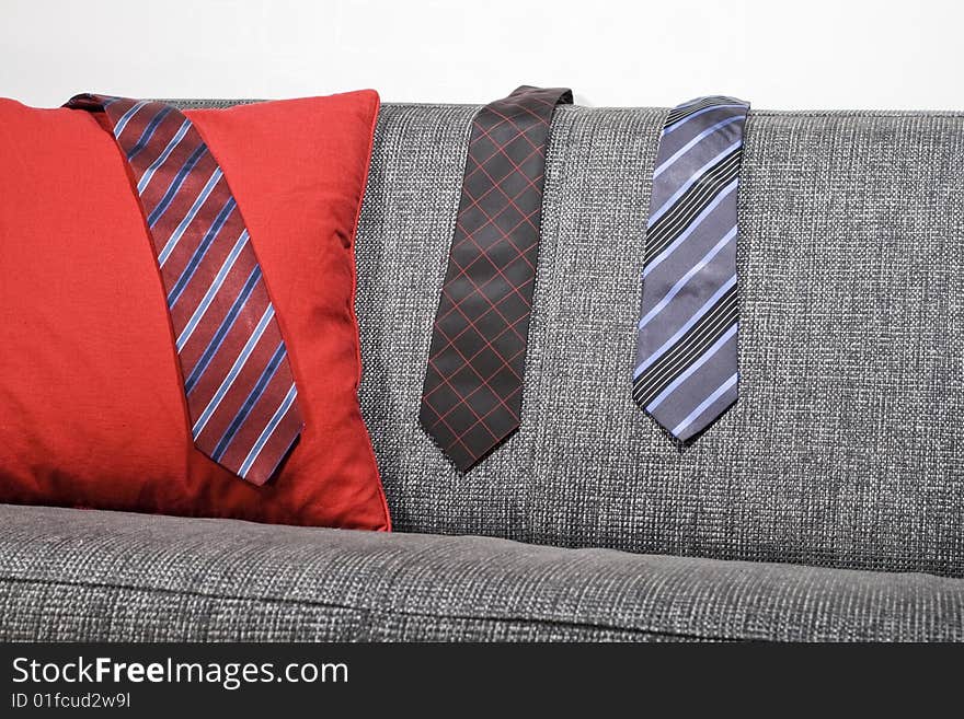 Ties hanging on a sofa. Ties hanging on a sofa