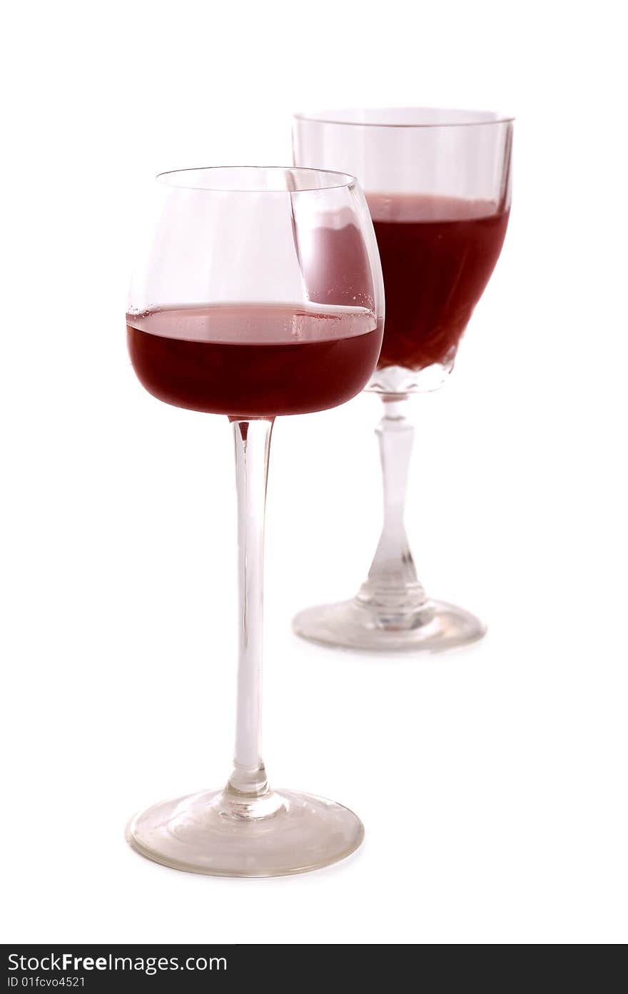 Two glass of red wine isolated on white