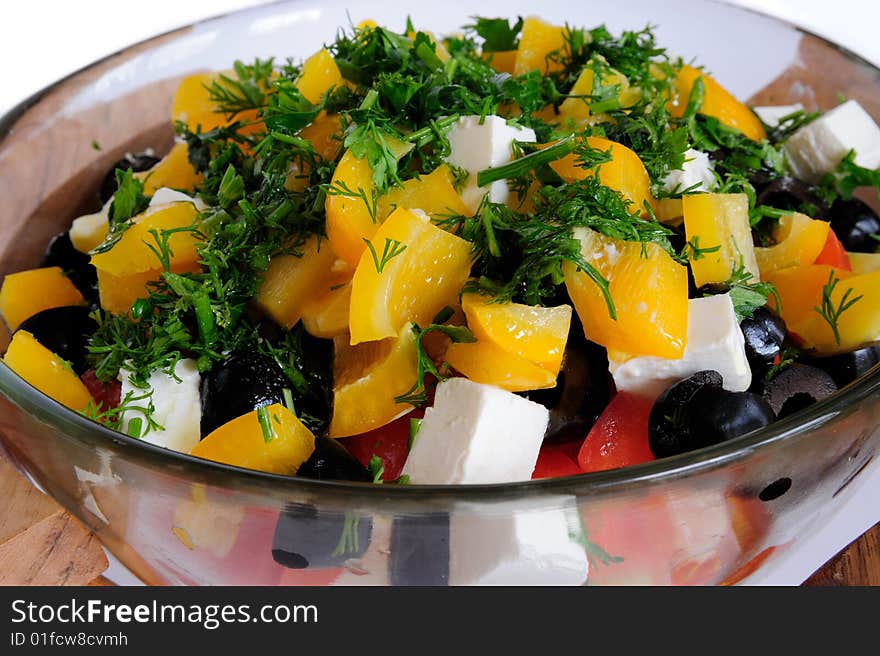 Greek salad in glass bowl