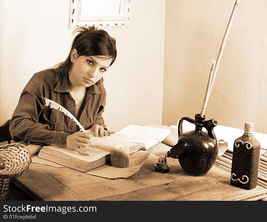 Business woman writting on parchment at office with retro objects