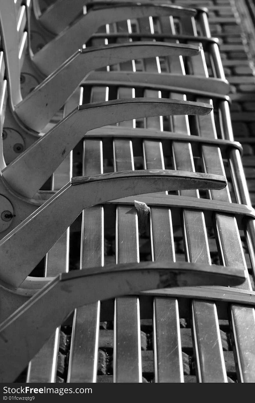 The details of the iron armchairs on the tram stop in Prague. The details of the iron armchairs on the tram stop in Prague.