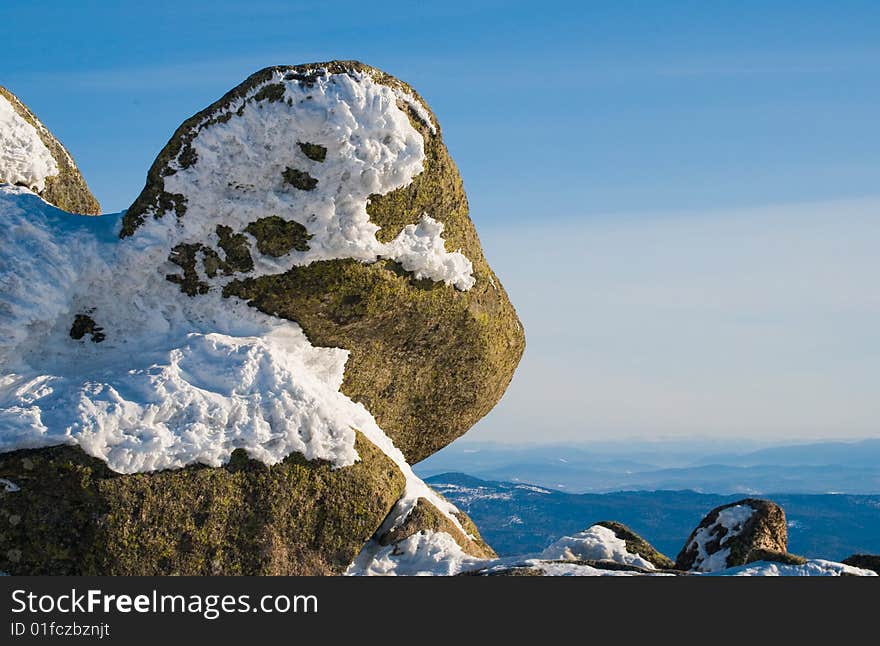 Stone with snow in beautiful winter mountains. Stone with snow in beautiful winter mountains