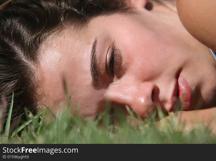 Sweet woman rest on the grass. Sweet woman rest on the grass