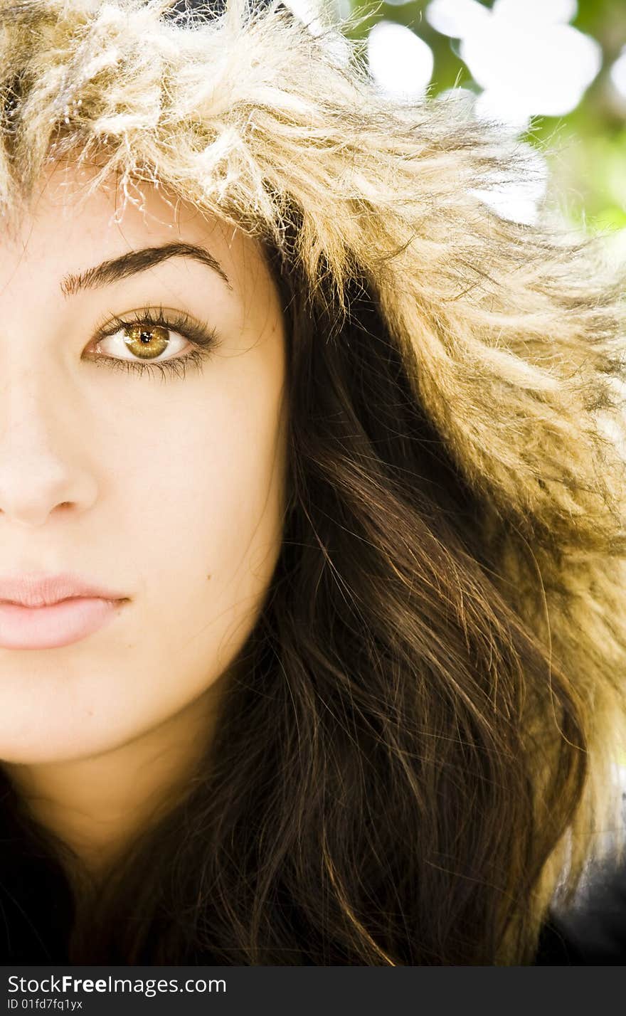 Woman portrait wearing a fur cap.