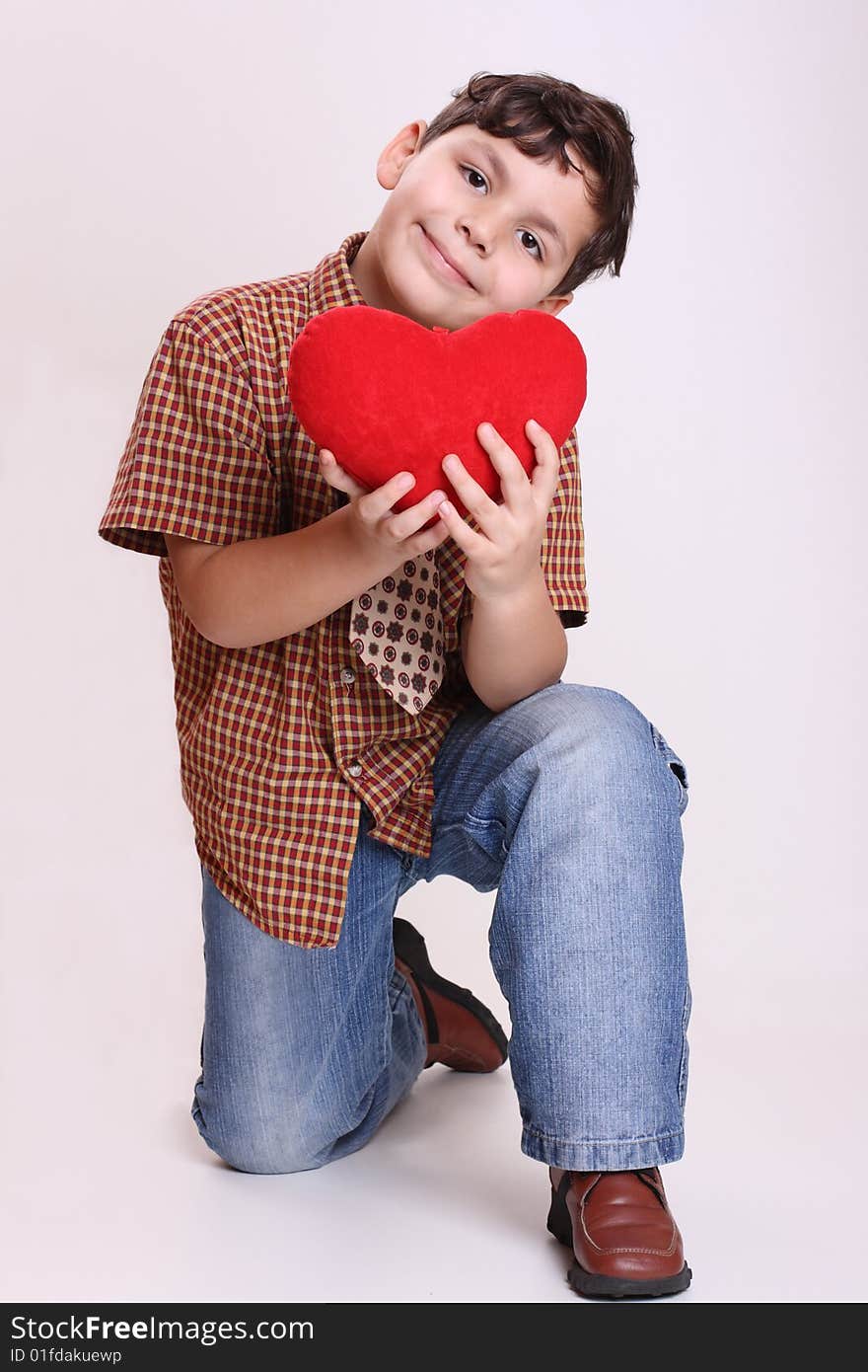 Small boy with a heart for the great love. Small boy with a heart for the great love