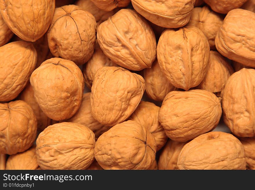 Closeup shot of Walnuts - Background Texture. Closeup shot of Walnuts - Background Texture