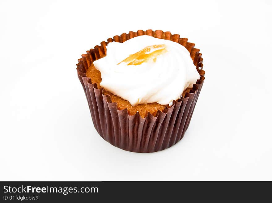 A cream cup cake isolated on white. A cream cup cake isolated on white