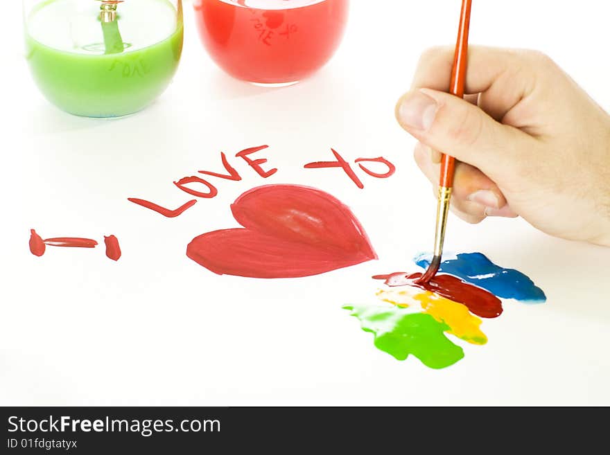 A man is painting a love notice to his lover. A man is painting a love notice to his lover