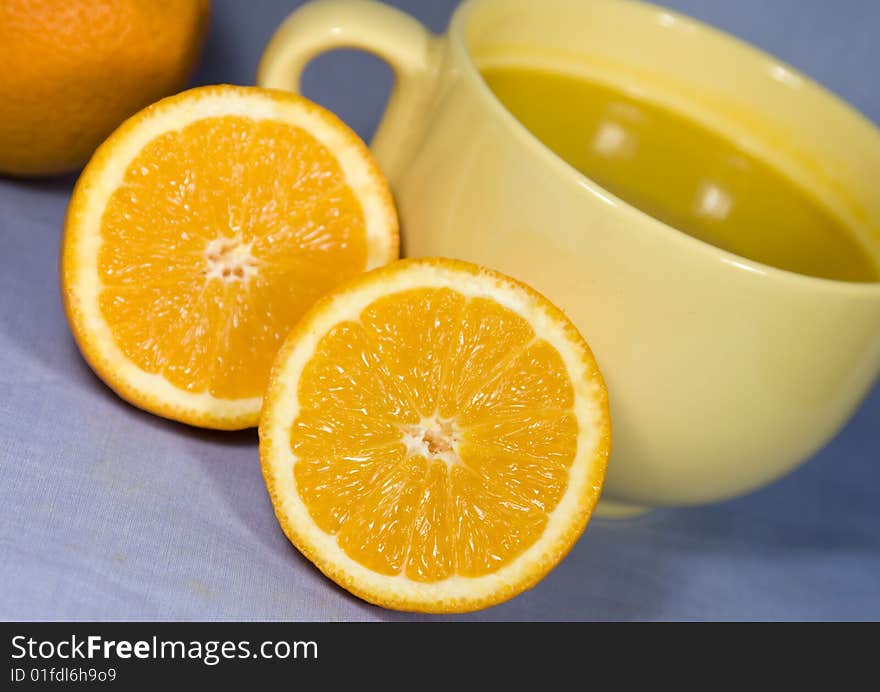 Fresh juicy oranges and orange juice. Fresh juicy oranges and orange juice