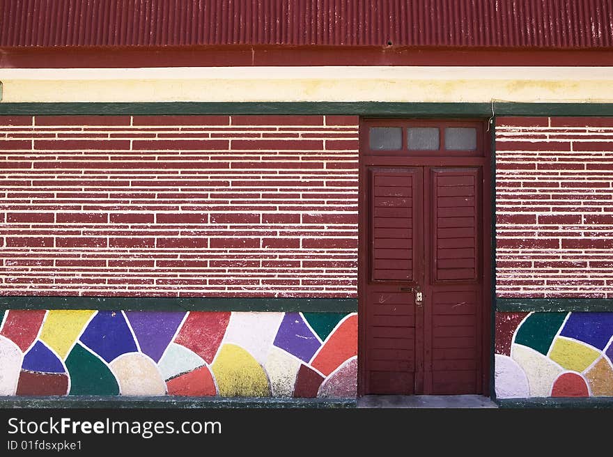 Colorful Tile And Dark Red Door