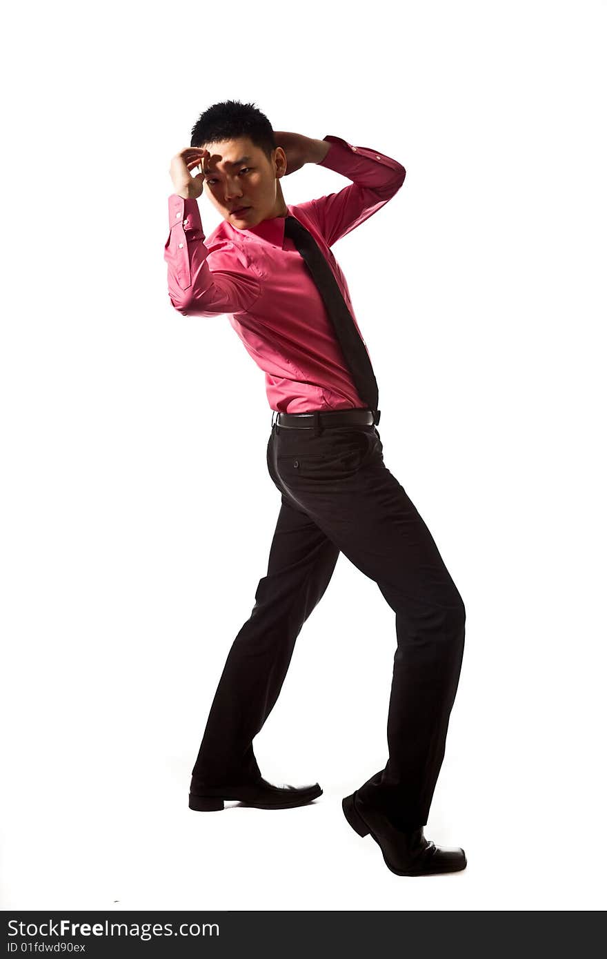 Stylish asian young man in formal attire with pink shirt and tie. Stylish asian young man in formal attire with pink shirt and tie