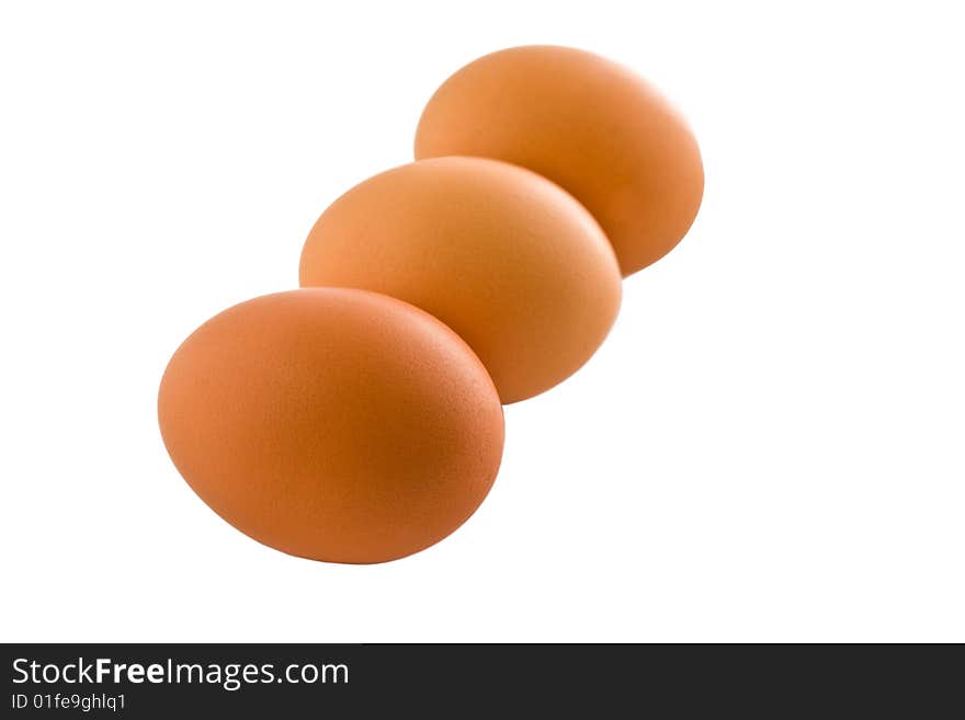 Three eggs on a white background without shadows