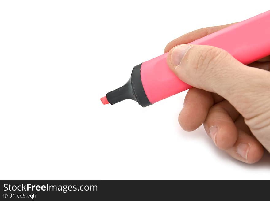 Pink marker in hand on white background