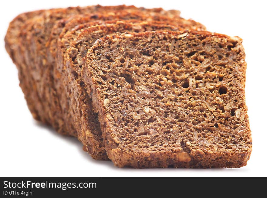 Pieces of cut bread isolated on a white background.