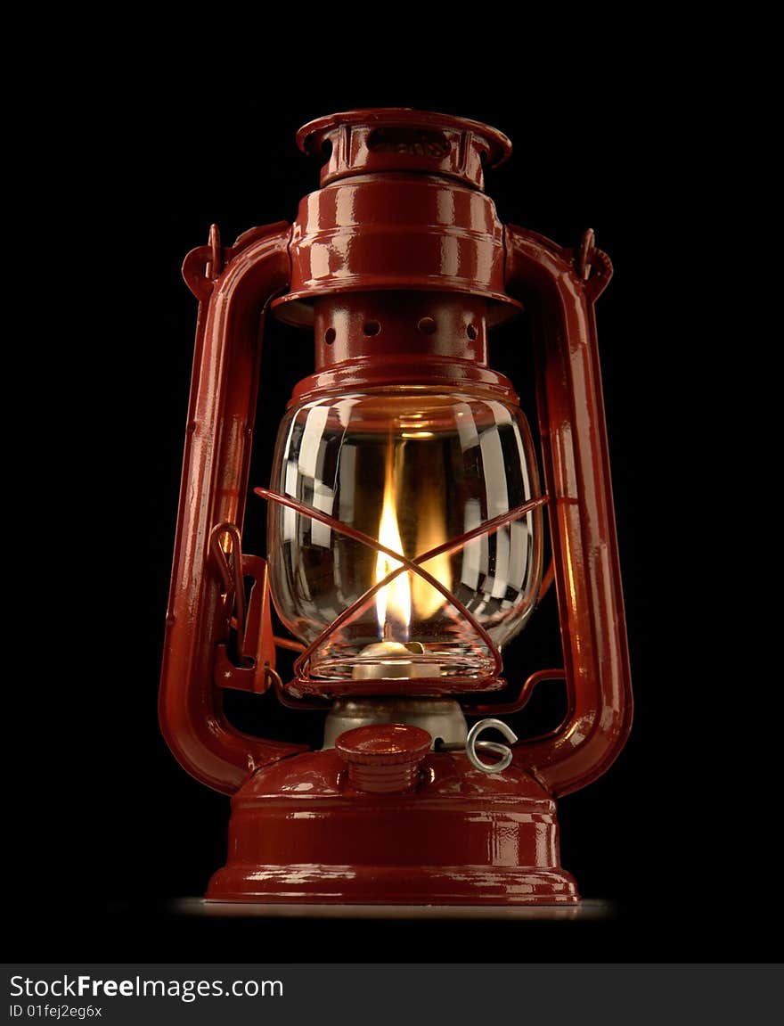 Kerosene lamp on a black background