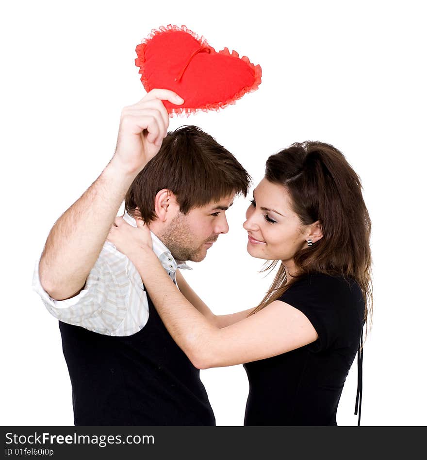 Stock photo: love theme: an image of a happy couple with a heart