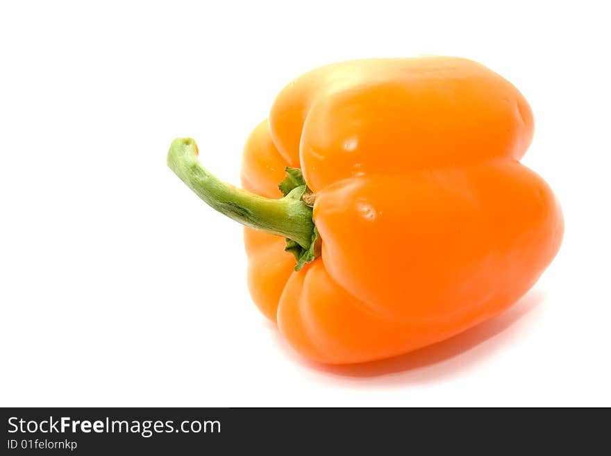 Pepper with a green pod on a white background. Pepper with a green pod on a white background