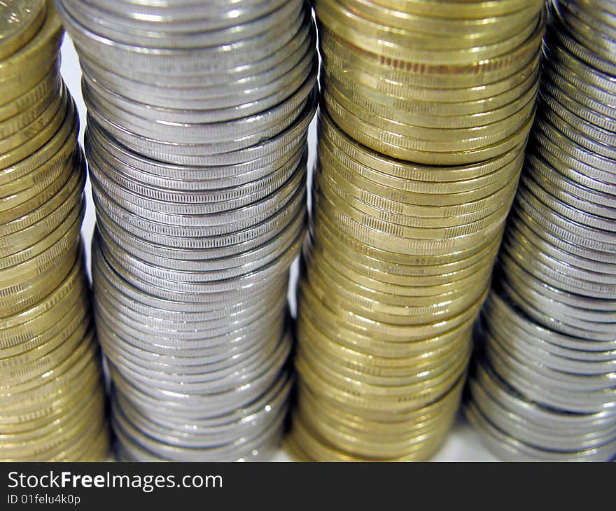 Pile folded coins. Coins stock