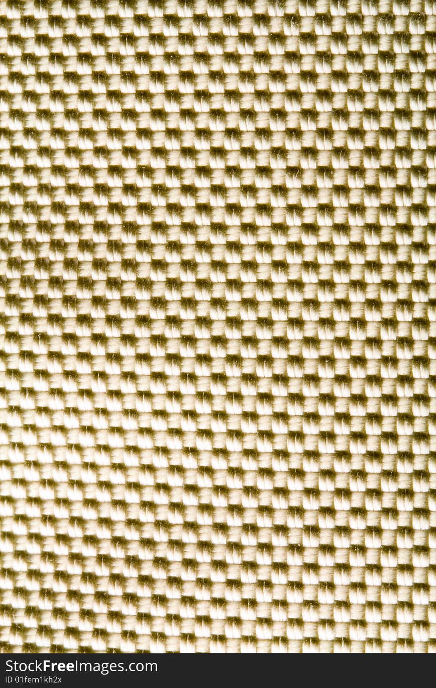 A close-up of the texture of grey nylon fabric. A close-up of the texture of grey nylon fabric