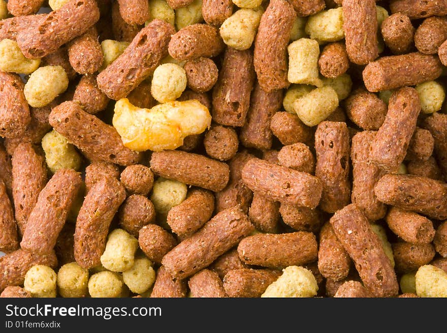 A close-up of a lot of dry reptile food. A close-up of a lot of dry reptile food