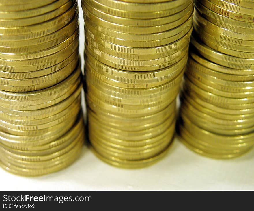 Pile folded coins. Coins stock