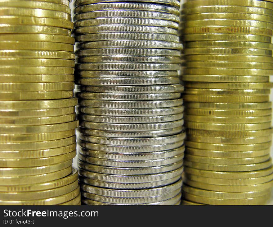 Pile folded coins. Coins stock