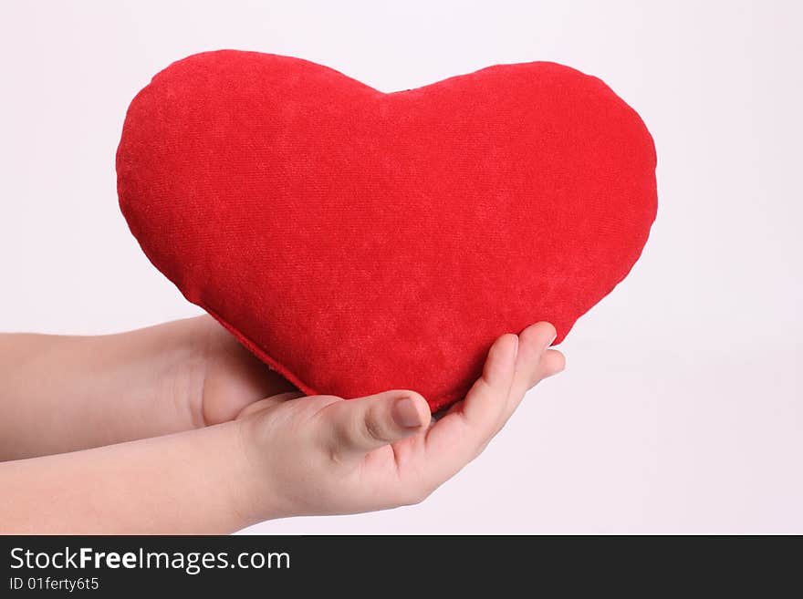 Big heart in the hands of the small gift. Big heart in the hands of the small gift