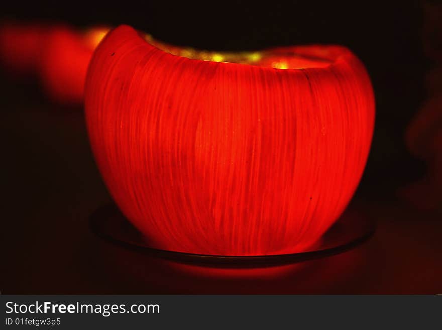 Still life photo. Three candles in the form of apples. Still life photo. Three candles in the form of apples.