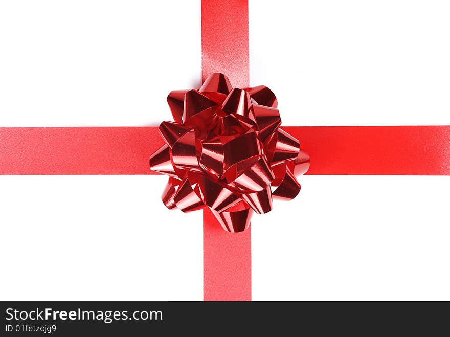 Red holiday bow on white background