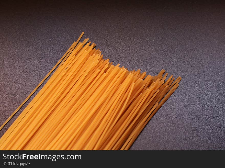 Italian spaghetti on a black background