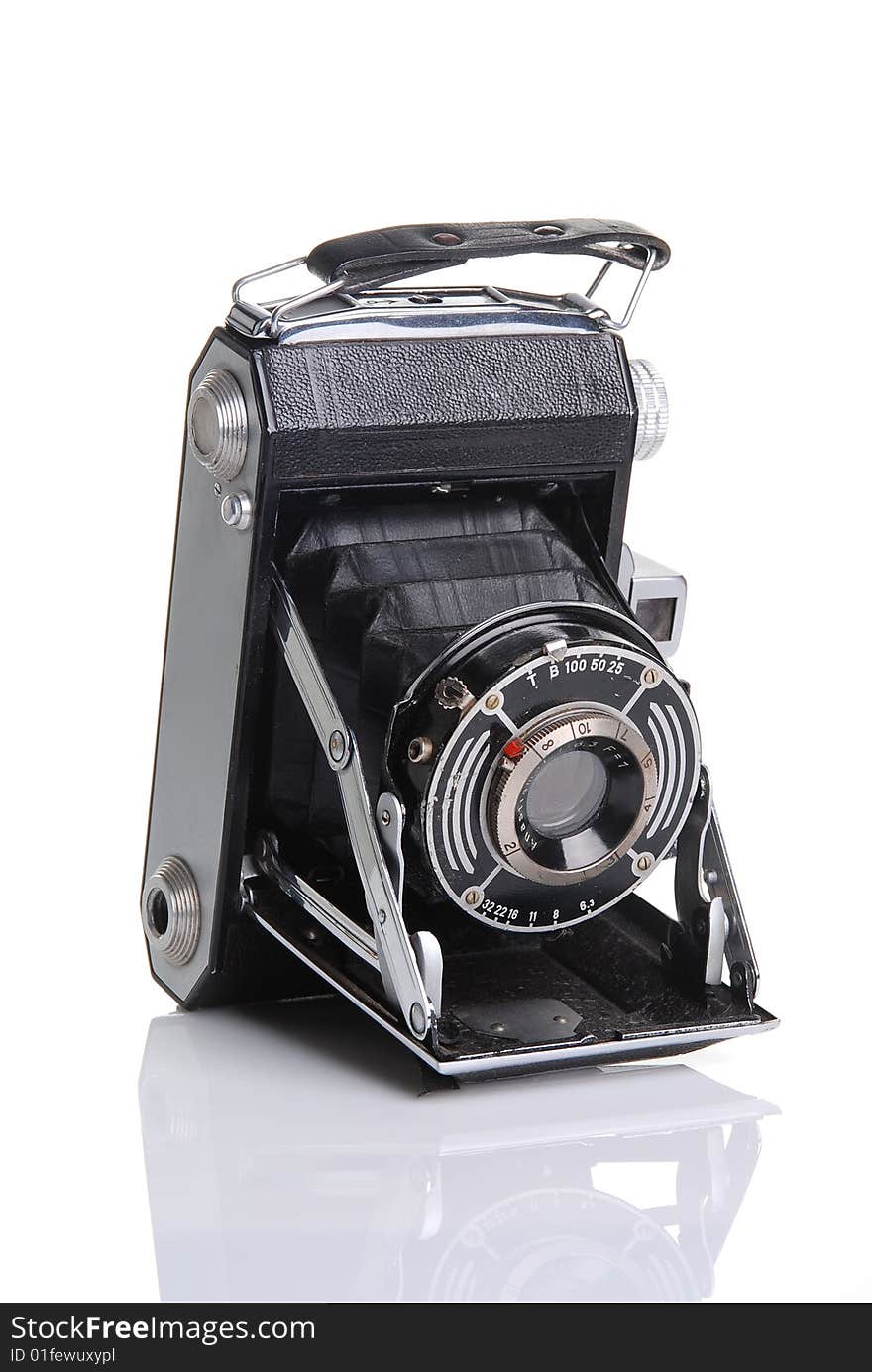 Vintage photo camera isolated on white background