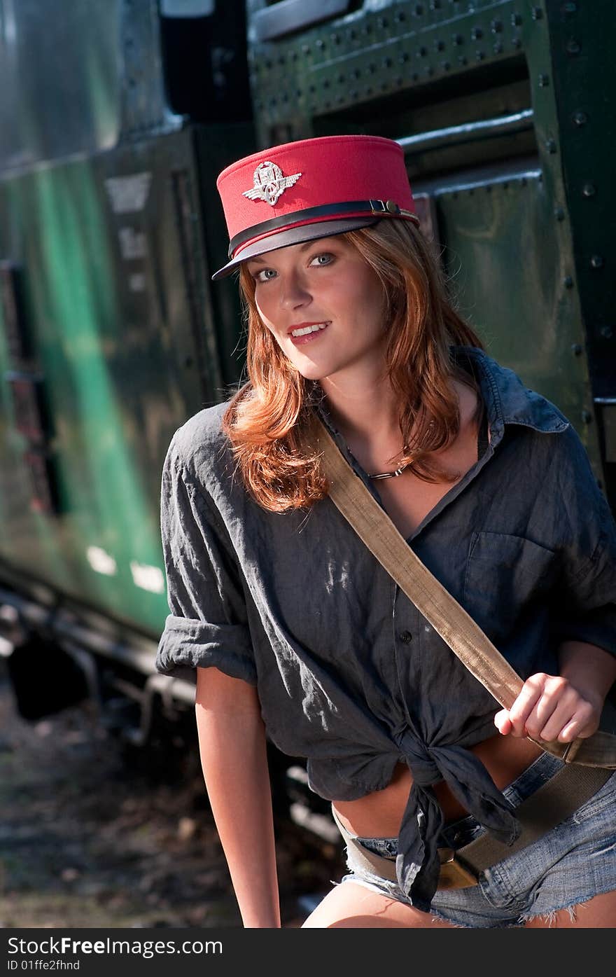 Young Woman With Conductor Cap