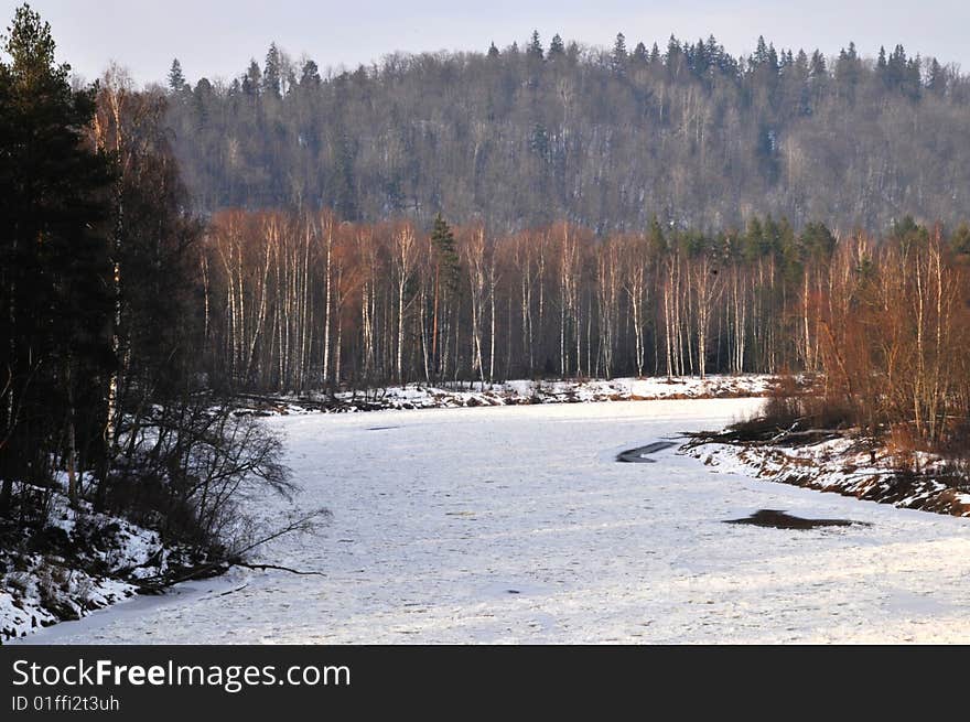 Ice on water, river bend.