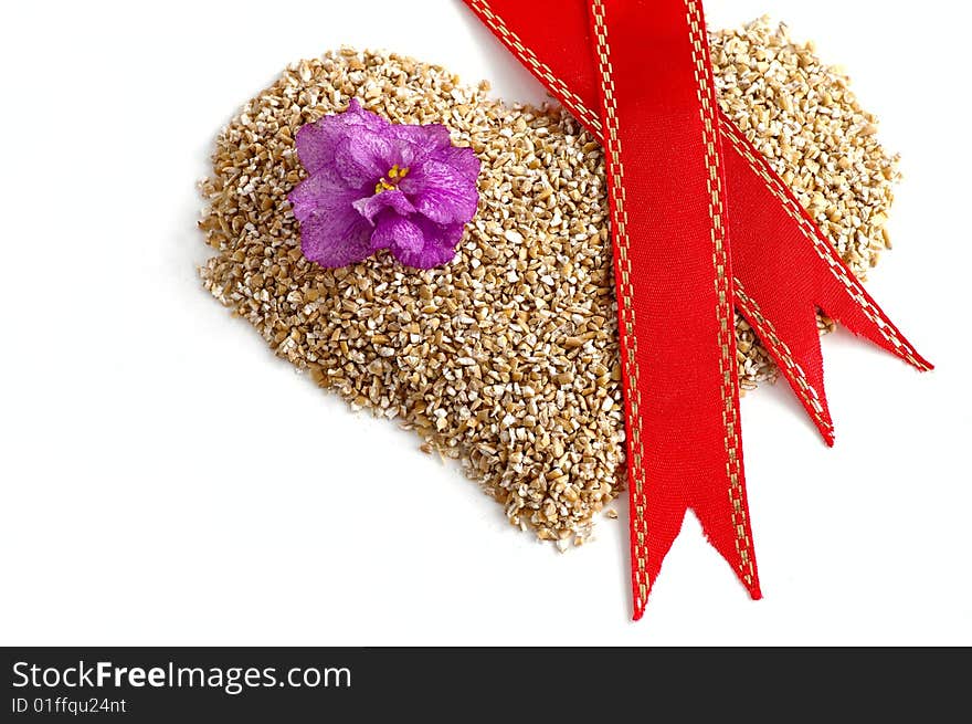 Heart with the flower and the tape against the white background. Heart with the flower and the tape against the white background