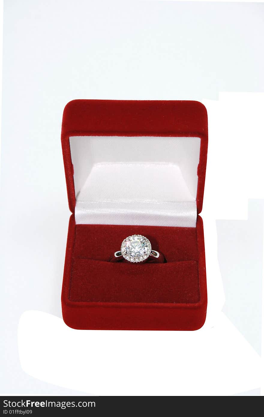 Golden ring with diamond in red box