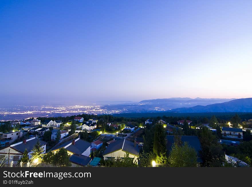 City lights under night sky