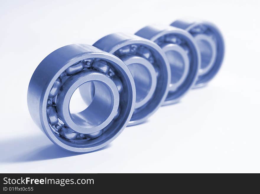 Four bearings. The photo is made by close up and colorized dark blue colour.